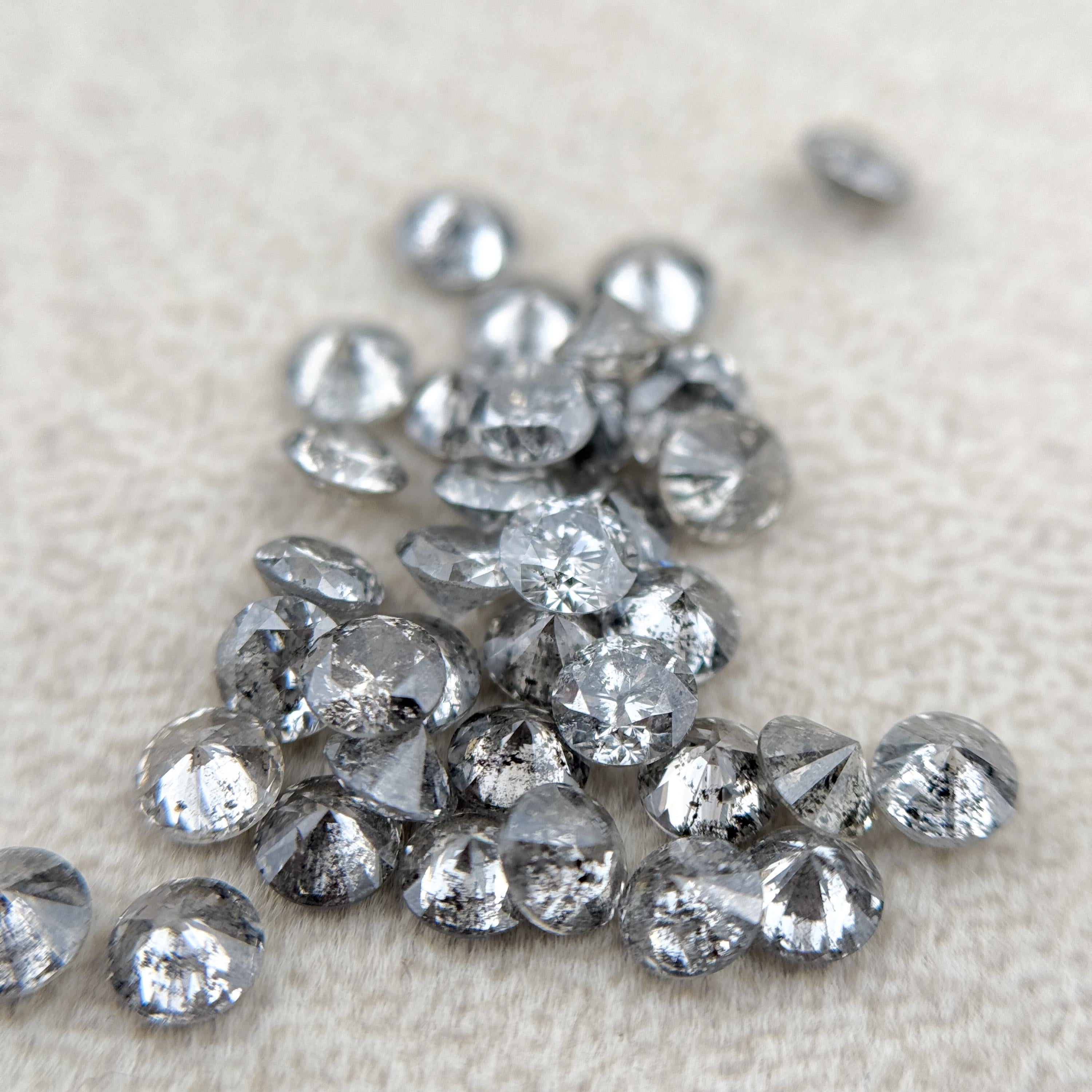 2.2 MM Round Brilliant Cut Grey Natural Fancy Diamond